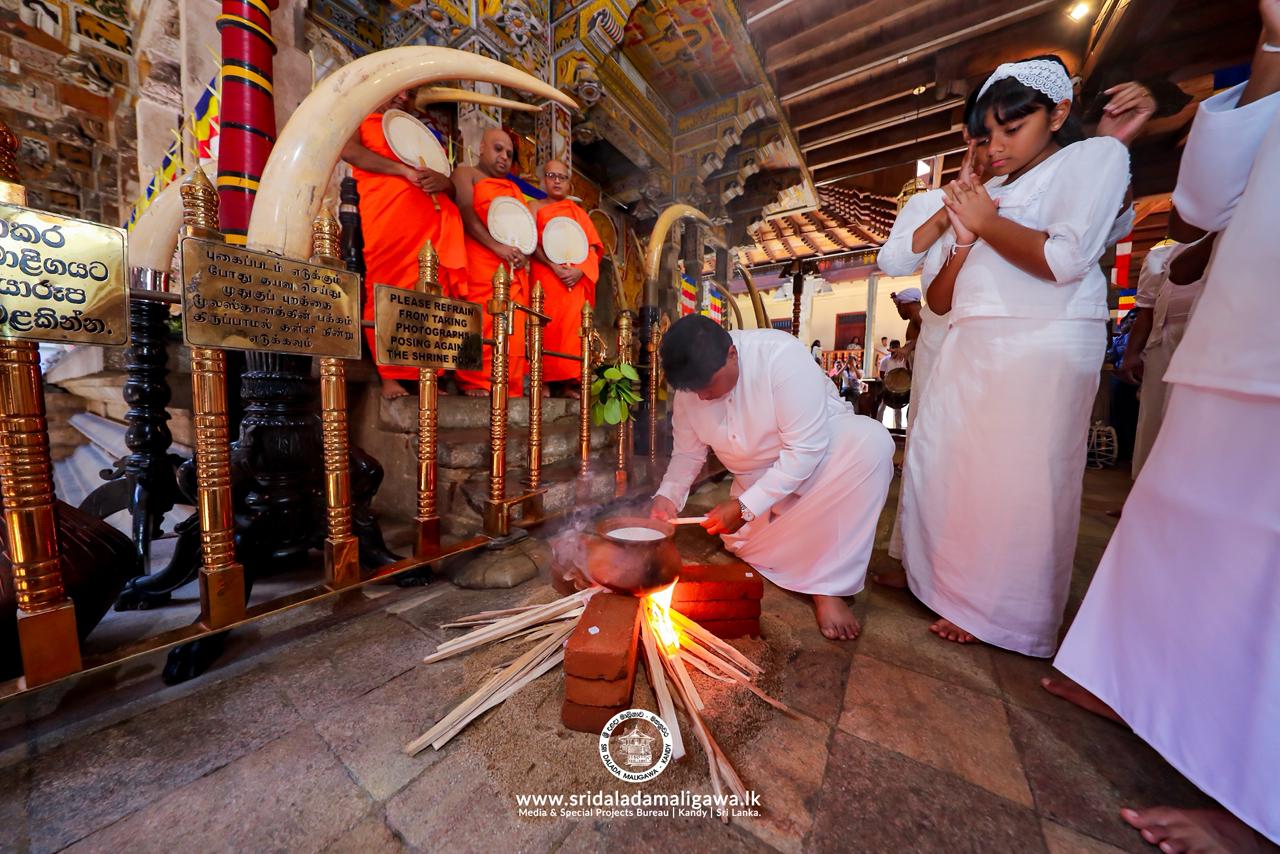 Lighting the Hearth at the: Maligawa